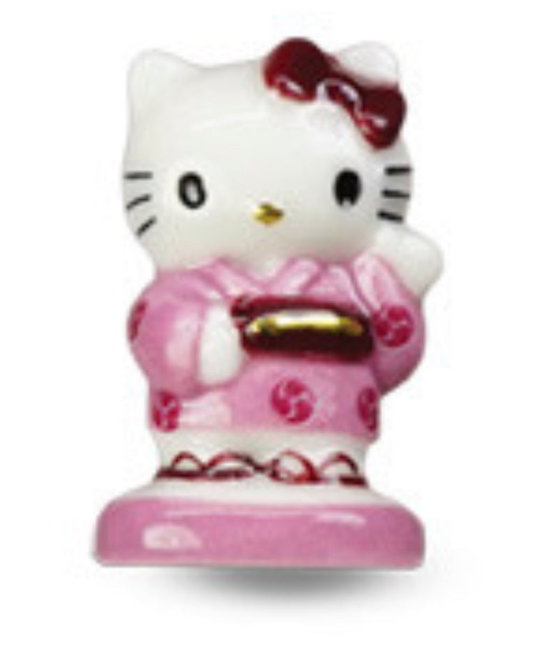 Bougie hello kitty avec sa fève